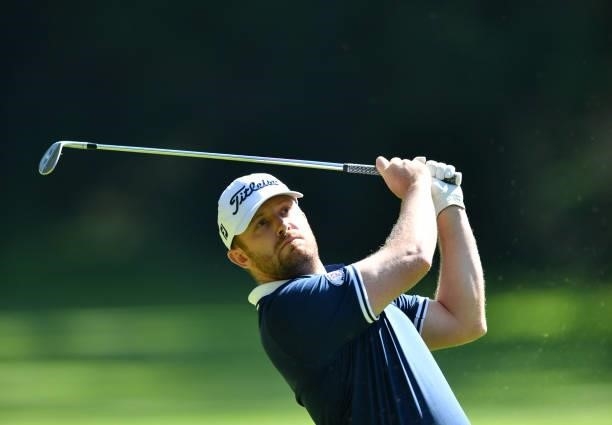Garrick Porteous of England plays his second shot to the 6th hole during Day One of The Omega European Masters at Crans-sur-Sierre Golf Club on...