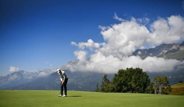Thomas Detry of Belgium putting at the 8th green during Day One of The Omega European Masters at Crans-sur-Sierre Golf Club on August 26, 2021 in...