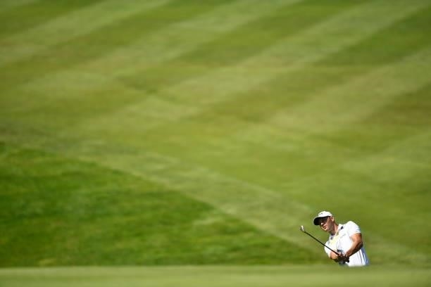 Martin Kaymer of Germany plays his third shot at the 7th hole during Day One of The Omega European Masters at Crans-sur-Sierre Golf Club on August...