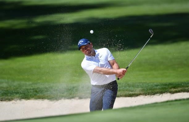 Francesco Molinari of Italy plays a bunker shot at the 5th hole during Day One of The Omega European Masters at Crans-sur-Sierre Golf Club on August...