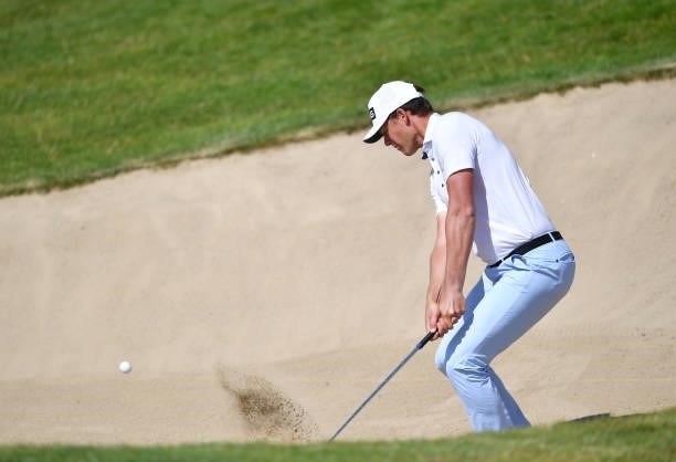 Victor Perez of France plays a bunker shot at the 7th hole during Day One of The Omega European Masters at Crans-sur-Sierre Golf Club on August 26,...