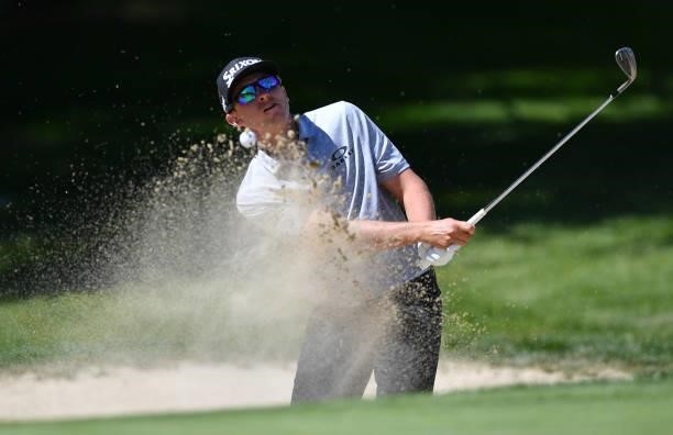 John Catlin of United States plays a bunker shot at the 5th hole during Day One of The Omega European Masters at Crans-sur-Sierre Golf Club on August...