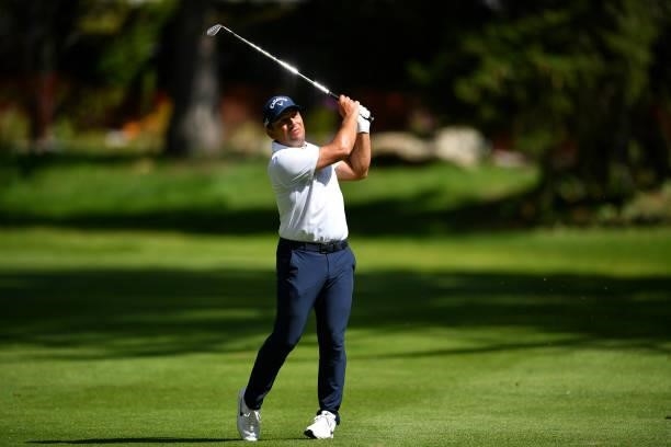 Francesco Molinari of Italy plays his second shot at the 6th hole during Day One of The Omega European Masters at Crans-sur-Sierre Golf Club on...