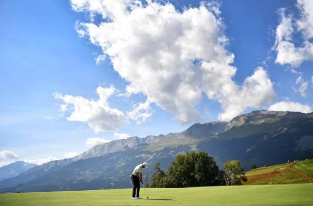Martin Kaymer of Germany putting at the 7th hole during Day One of The Omega European Masters at Crans-sur-Sierre Golf Club on August 26, 2021 in...