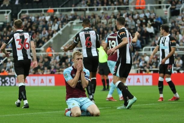 Ben Mee of Burnley reacts during the Carabao Cup match between Newcastle United and Burnley at St. James's Park, Newcastle on Wednesday 25th August...
