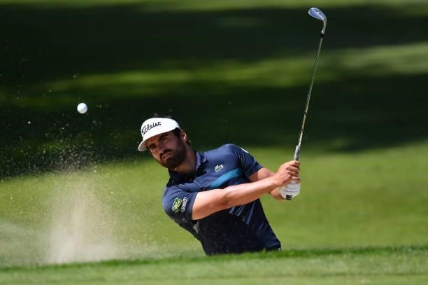 Antoine Rozner of France plays a bunker shot at the 5th hole during Day One of The Omega European Masters at Crans-sur-Sierre Golf Club on August 26,...