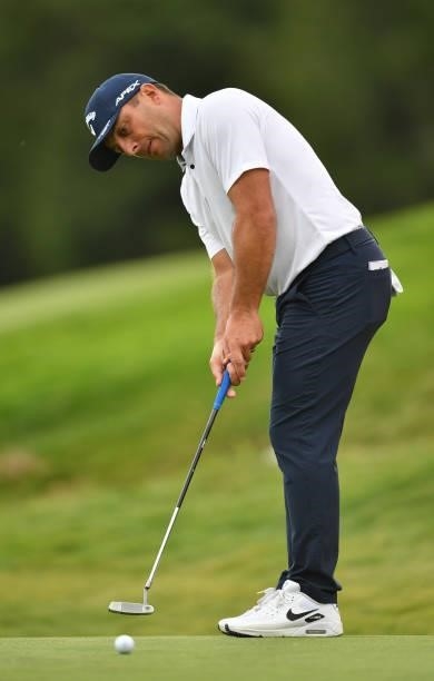 Francesco Molinari of Italy putting at the 18th hole during Day One of The Omega European Masters at Crans-sur-Sierre Golf Club on August 26, 2021 in...