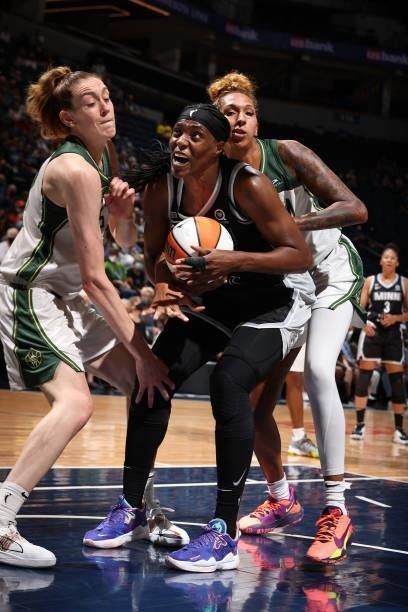 Sylvia Fowles of the Minnesota Lynx handles the ball against the Seattle Storm on August 24, 2021 at Target Center in Minneapolis, Minnesota. NOTE TO...