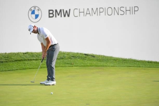 Patrick Cantlay putts on the 15th green during the first round of the BMW Championship at Caves Valley Golf Club on August 26, 2021 in Owings Mills,...