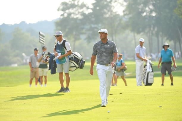 Bryson DeChambeau walks towards his ball on the 15th fairway during the first round of the BMW Championship at Caves Valley Golf Club on August 26,...