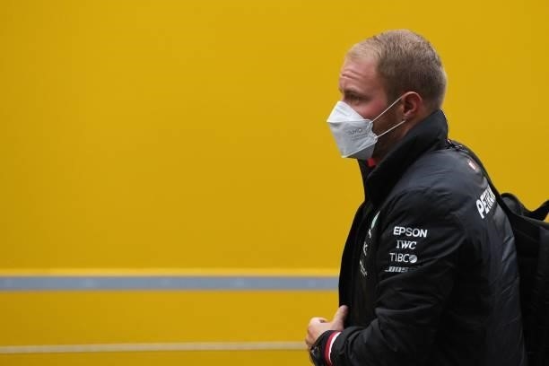 Mercedes' Finnish driver Valtteri Bottas walks out of the paddock at the Spa-Francorchamps circuit in Spa on August 27 ahead of the Formula One...
