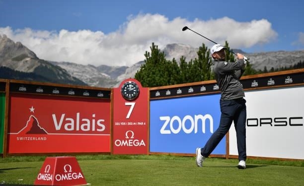 Garrick Porteous of England plays his tee shot at the 7th hole during Day Two of The Omega European Masters at Crans-sur-Sierre Golf Club on August...