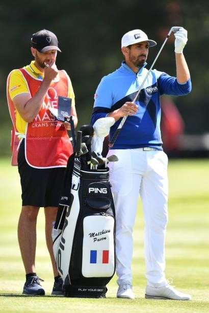 Matthieu Pavon of France prepares to play his second shot at the 4th hole during Day Two of The Omega European Masters at Crans-sur-Sierre Golf Club...