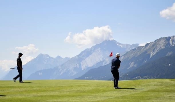 Andy Sullivan of England plays this second shot at the 7th hole during Day Two of The Omega European Masters at Crans-sur-Sierre Golf Club on August...