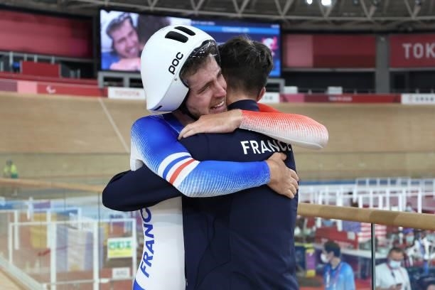 Dorian Foulon of Team France celebrates with Alexandre Leaute of Team France after winning the gold medal after the Track Cycling Men's C5 4000m...