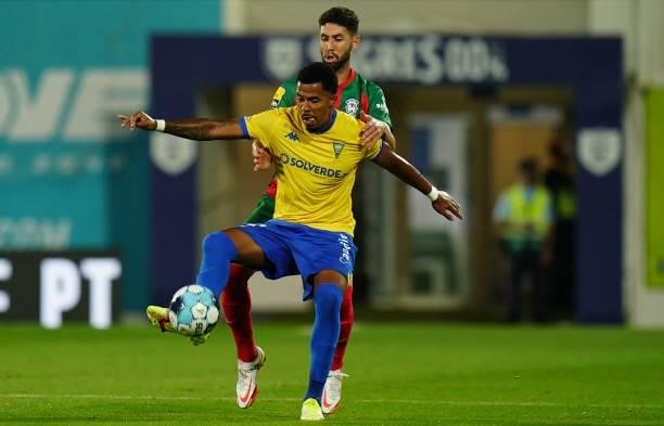 Andre Clovis of GD Estoril Praia with Leo Andrade of CS Maritimo in action during the Liga Bwin match between GD Estoril Praia and CS Maritimo at...