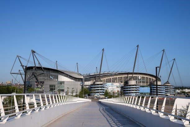 General external view of Etihad Stadium, home stadium of Manchester City under blue skies ahead of the Premier League match between Manchester City...