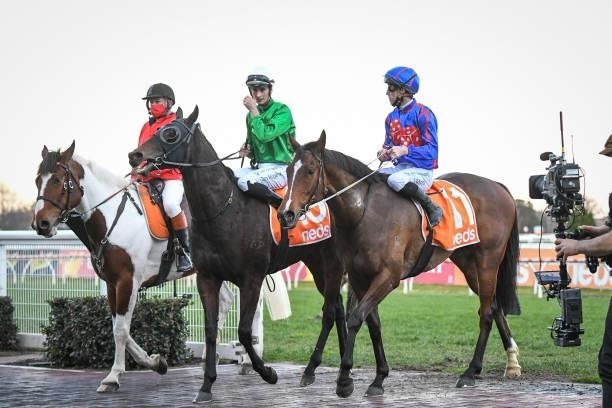 John Allen returns to the mounting yard on Ayrton after winning the Neds Filter Form Handicap , at Caulfield Racecourse on August 28, 2021 in...