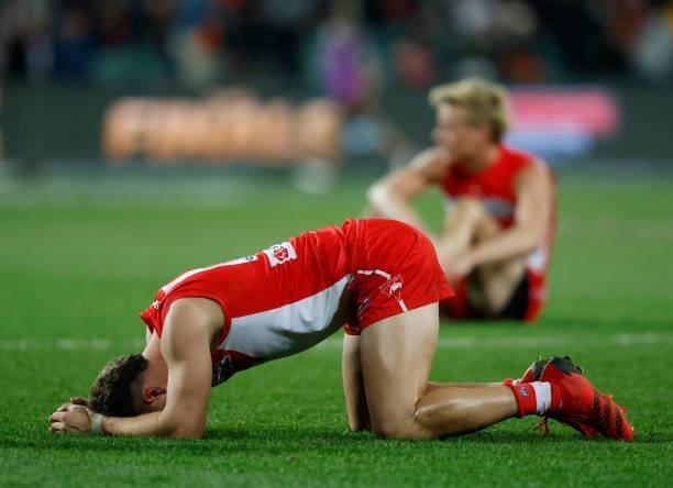 Swans players react to the loss during the 2021 AFL Second Elimination Final match between the Sydney Swans and the GWS Giants at University of...