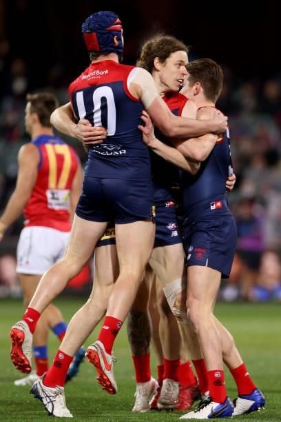Ben Brown of the Demons celebrates a goal with his teammates during the 2021 AFL First Qualifying Final match between the Melbourne Demons and the...