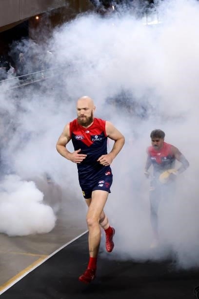 Max Gawn of the Demons leads his team out during the 2021 AFL First Qualifying Final match between the Melbourne Demons and the Brisbane Lions at...
