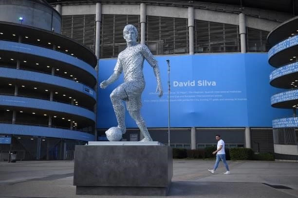 The newly-unveiled statue of former Manchester City footballer David Silva is pictured outside the stadium ahead of the English Premier League...