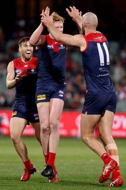DClayton Oliver of the Demons celebrates a goal uring the 2021 AFL First Qualifying Final match between the Melbourne Demons and the Brisbane Lions...