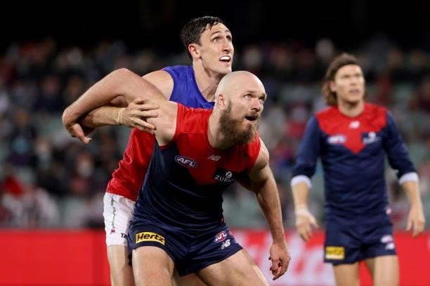 Max Gawn of the Demons competes with Oscar McInerney of the Lions during the 2021 AFL First Qualifying Final match between the Melbourne Demons and...