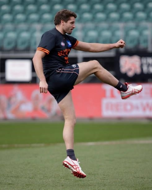 Zach Sproule of the Giants kicks the ball during the 2021 AFL Second Elimination Final match between the Sydney Swans and the GWS Giants at...