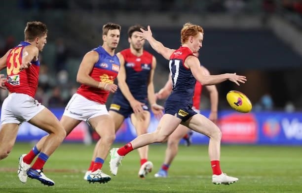 Clayton Oliver of the Demons kicks the ball during the 2021 AFL First Qualifying Final match between the Melbourne Demons and the Brisbane Lions at...