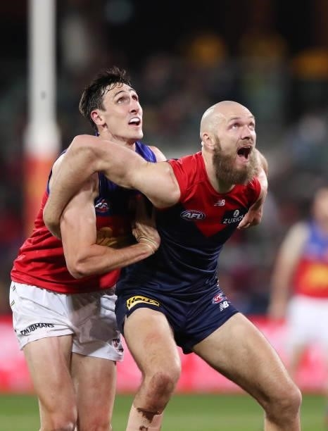 Oscar McInerney of the Lions and Max Gawn of the Demons during the 2021 AFL First Qualifying Final match between the Melbourne Demons and the...