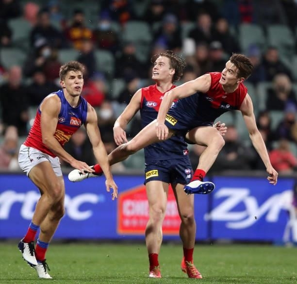 Bayley Fritsch of the Demons snaps a goal with team mate Trent Rivers watching during the 2021 AFL First Qualifying Final match between the Melbourne...