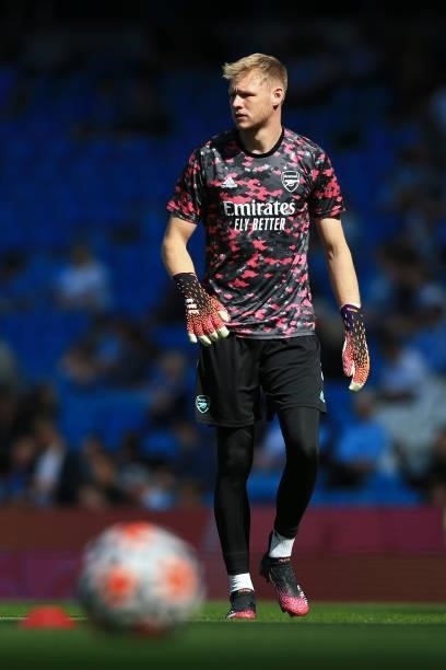 Arsenal goalkeeper Aaron Ramsdale warms up before the Premier League match between Manchester City and Arsenal at Etihad Stadium on August 28, 2021...