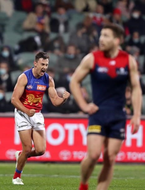 Hugh McCluggage of the Lions celebrates a goal during the 2021 AFL First Qualifying Final match between the Melbourne Demons and the Brisbane Lions...