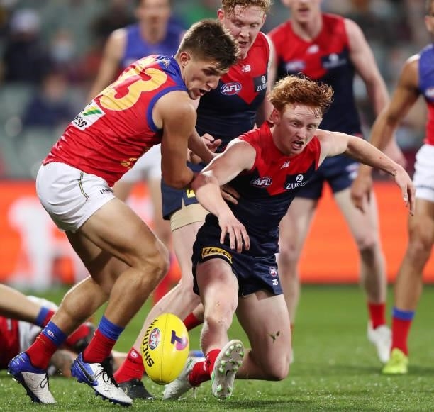 Zac Bailey of the Lions and Jake Bowey of the Demons during the 2021 AFL First Qualifying Final match between the Melbourne Demons and the Brisbane...