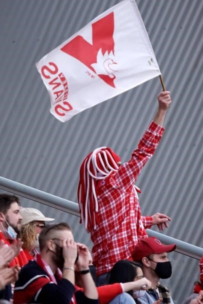 Fan celebrates a goal during the 2021 AFL Second Elimination Final match between the Sydney Swans and the GWS Giants at University of Tasmania...