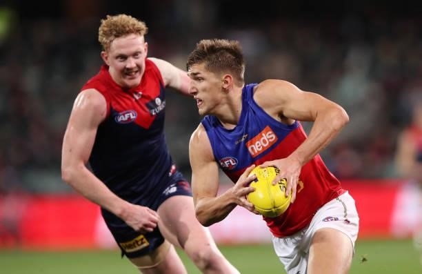 Zac Bailey of the Lions and Clayton Oliver of the Demons during the 2021 AFL First Qualifying Final match between the Melbourne Demons and the...