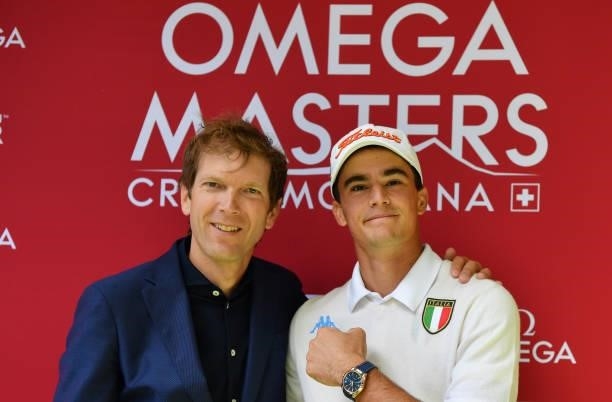Pietro Bovari of Italy , with Jean Pascal Perret of Omega , after his hole in one during Day Three of The Omega European Masters at Crans-sur-Sierre...
