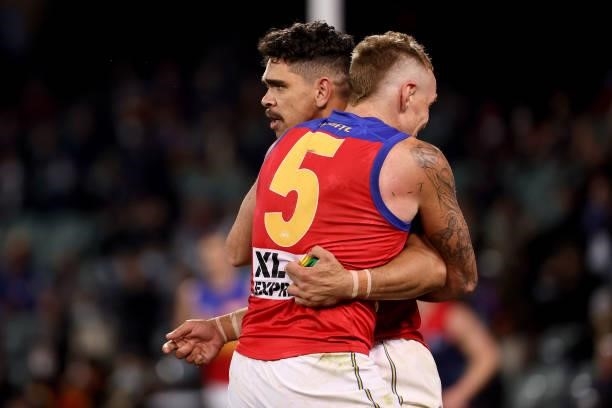 Mitch Robinson and Charlie Cameron of the Lions celebrate a goal during the 2021 AFL First Qualifying Final match between the Melbourne Demons and...