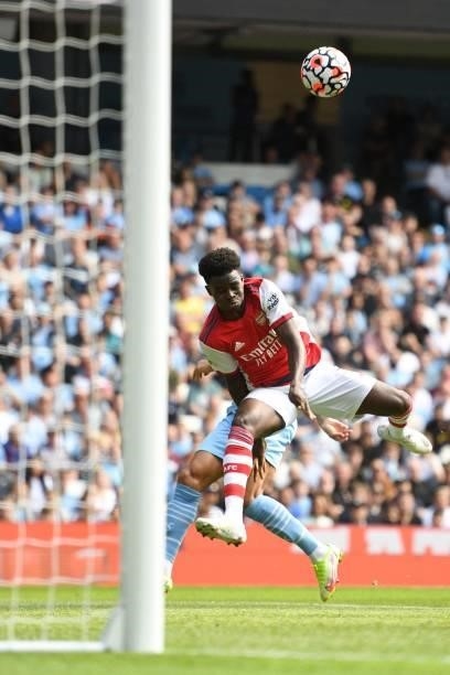 Arsenal's Bukayo Saka takes a shot at goal during the English Premier League football match between Manchester City and Arsenal at the Etihad Stadium...