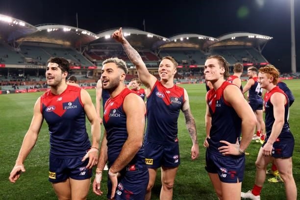 The Demons celebrate their win during the 2021 AFL First Qualifying Final match between the Melbourne Demons and the Brisbane Lions at Adelaide Oval...