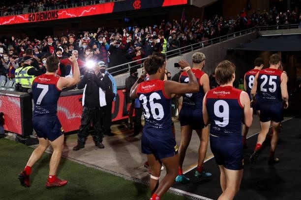 The Demons celebrate their win during the 2021 AFL First Qualifying Final match between the Melbourne Demons and the Brisbane Lions at Adelaide Oval...