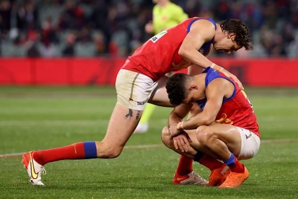 Joe Daniher and Charlie Cameron of the Lions after their loss during the 2021 AFL First Qualifying Final match between the Melbourne Demons and the...
