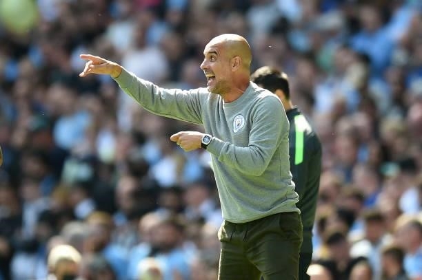 Manchester City's Spanish manager Pep Guardiola gestures during the English Premier League football match between Manchester City and Arsenal at the...