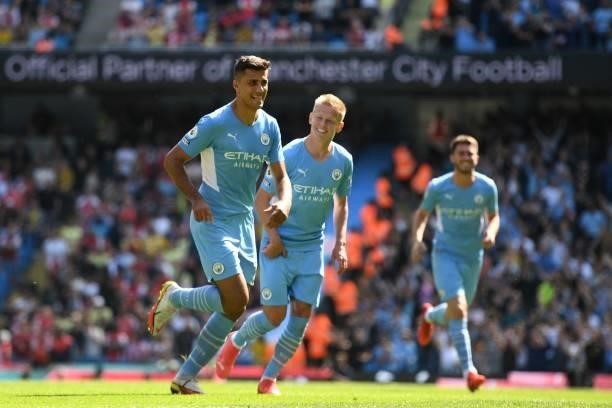 Manchester City's Spanish midfielder Rodrigo celebrates scoring his team's fourth goal during the English Premier League football match between...