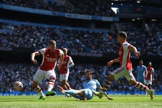 Manchester City's Portuguese midfielder Bernardo Silva takes a shot during the English Premier League football match between Manchester City and...