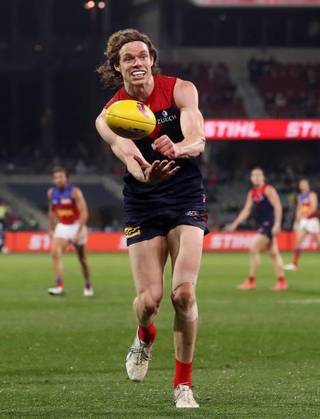 Ben Brown handpasses the ball during the 2021 AFL First Qualifying Final match between the Melbourne Demons and the Brisbane Lions at Adelaide Oval...