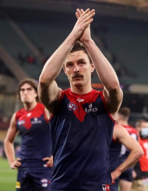 Jake Lever of the Demons applauds the crowd after the win during the 2021 AFL First Qualifying Final match between the Melbourne Demons and the...