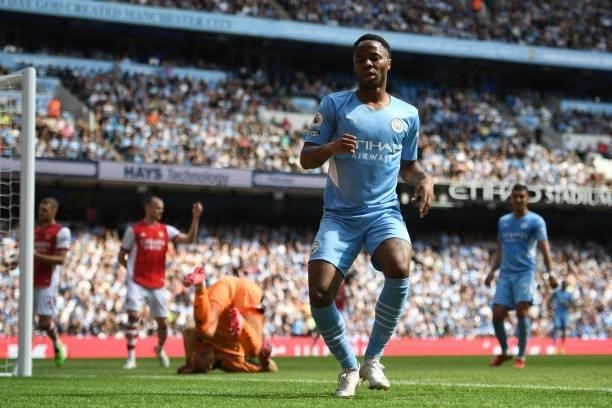 Manchester City's English midfielder Raheem Sterling reacts to a missed chance during the English Premier League football match between Manchester...
