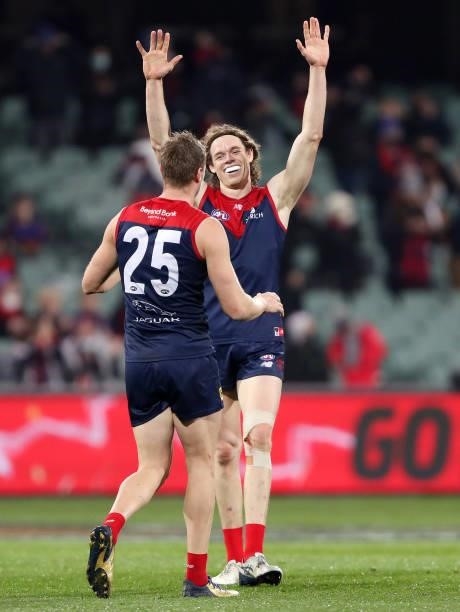Ben Brown of the Demons celebrates on the siren with Tom McDonald during the 2021 AFL First Qualifying Final match between the Melbourne Demons and...